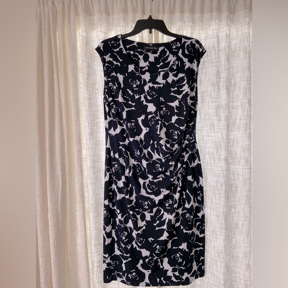 Women’s black floral dress.